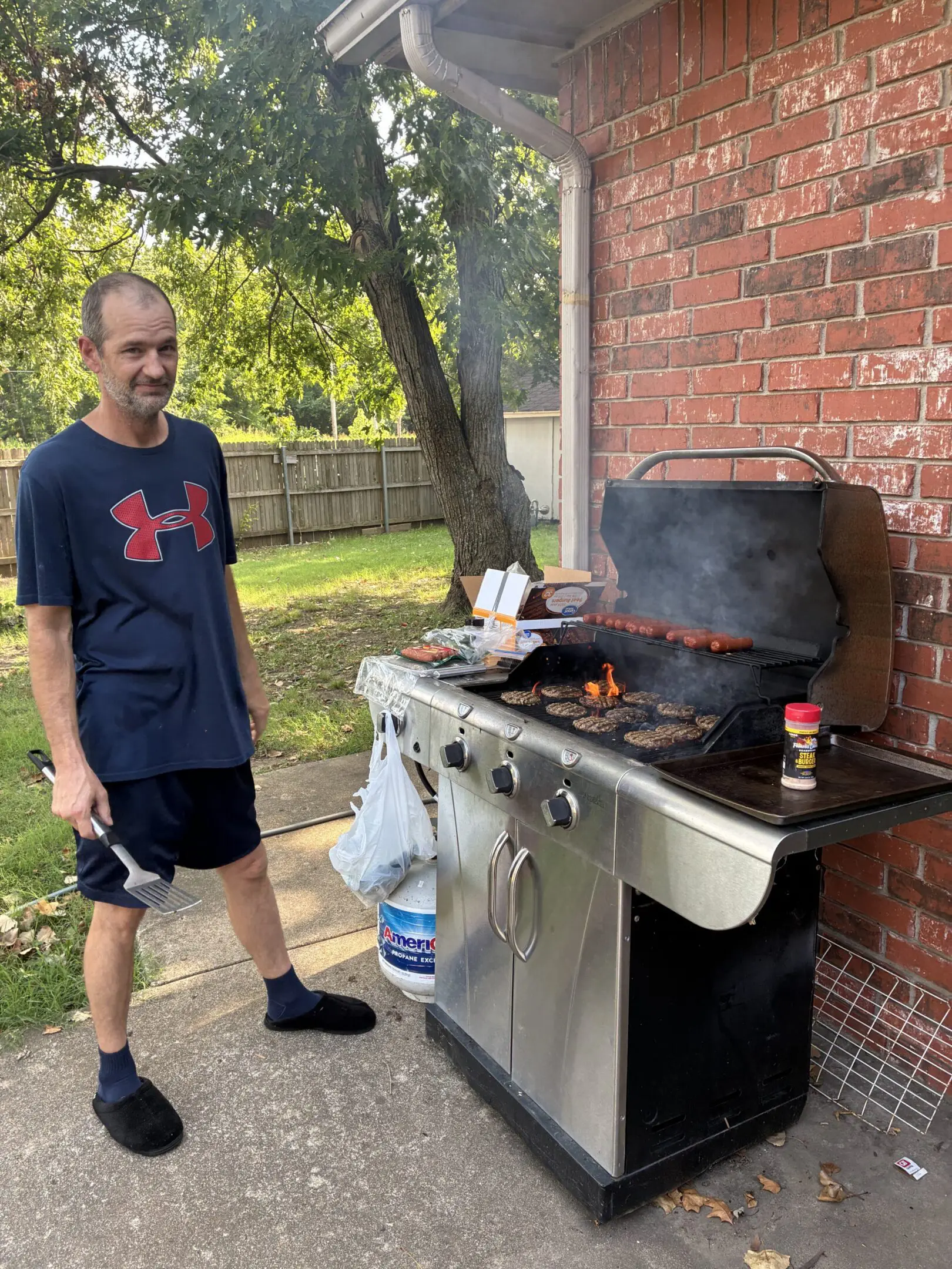 Backyard barbecue with grill